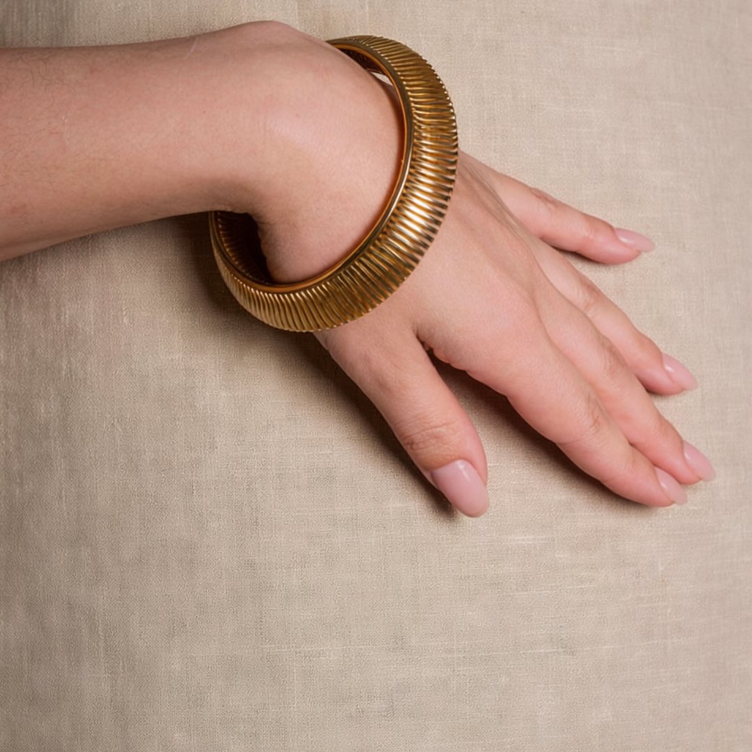 Bracciale Orbita in bronzo placcato oro ANIDI con finitura lucida